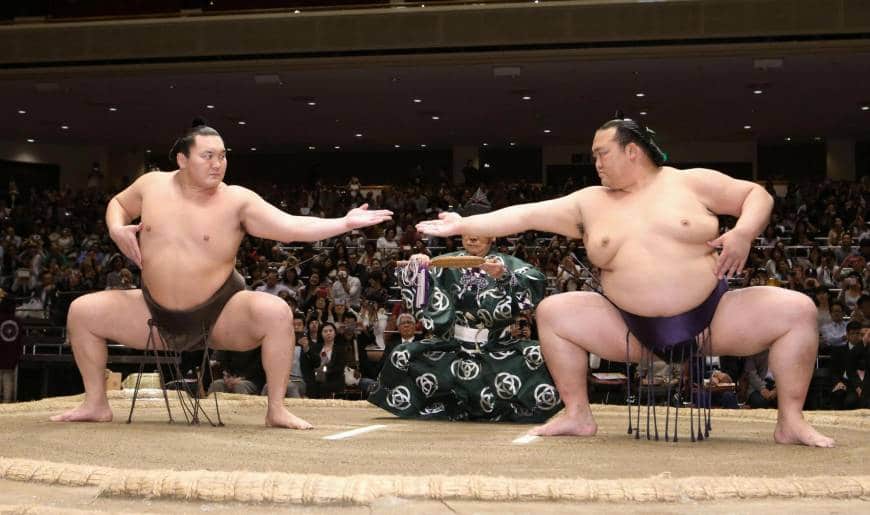 international-teacher-experience-in-japan-sumo-wrestling-two huge-japanese-men-about-to-fight