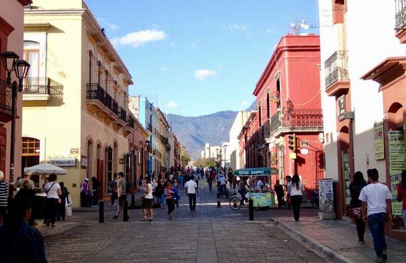 a-beautiful-rural-town-in-mexico-with-english-teacher-and-students-walking-through