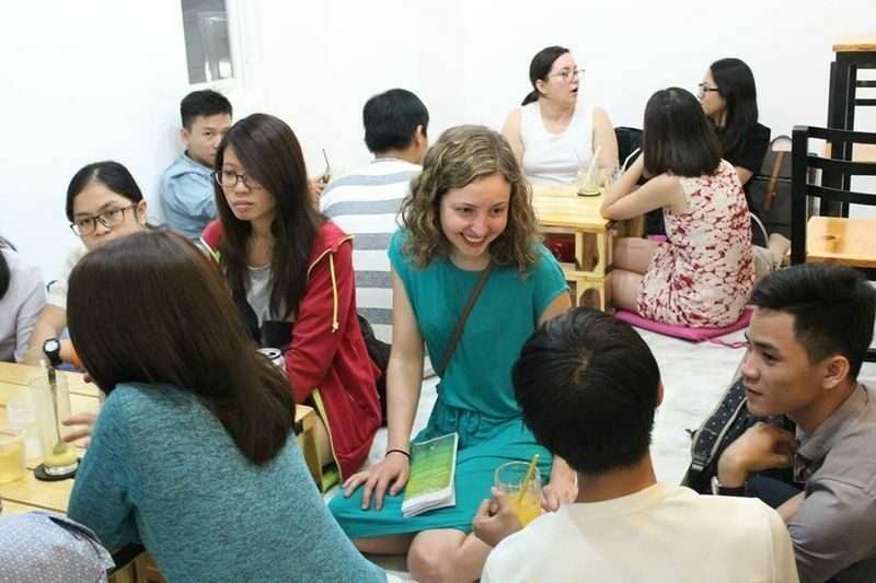 an-english-teacher-giving-a-lesson-in-a-coffee-shop-in-vietnam
